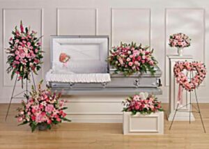 Beautiful Memories Collection featuring seven hand-made sympathy flower arrangements in soft pink tones, designed to honour cherished memories with elegant, feminine floral displays