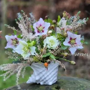 Delicate floral ornament inspired by an English garden, featuring detailed blooms and natural elements as a charming keepsake