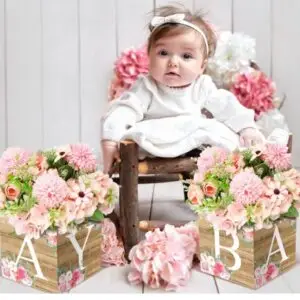“Set of 12 rustic floral baby shower decorations featuring brown wood grain baby boxes with white letters, designed for table centerpieces with flowers for baby showers, birthdays, or gender reveal parties